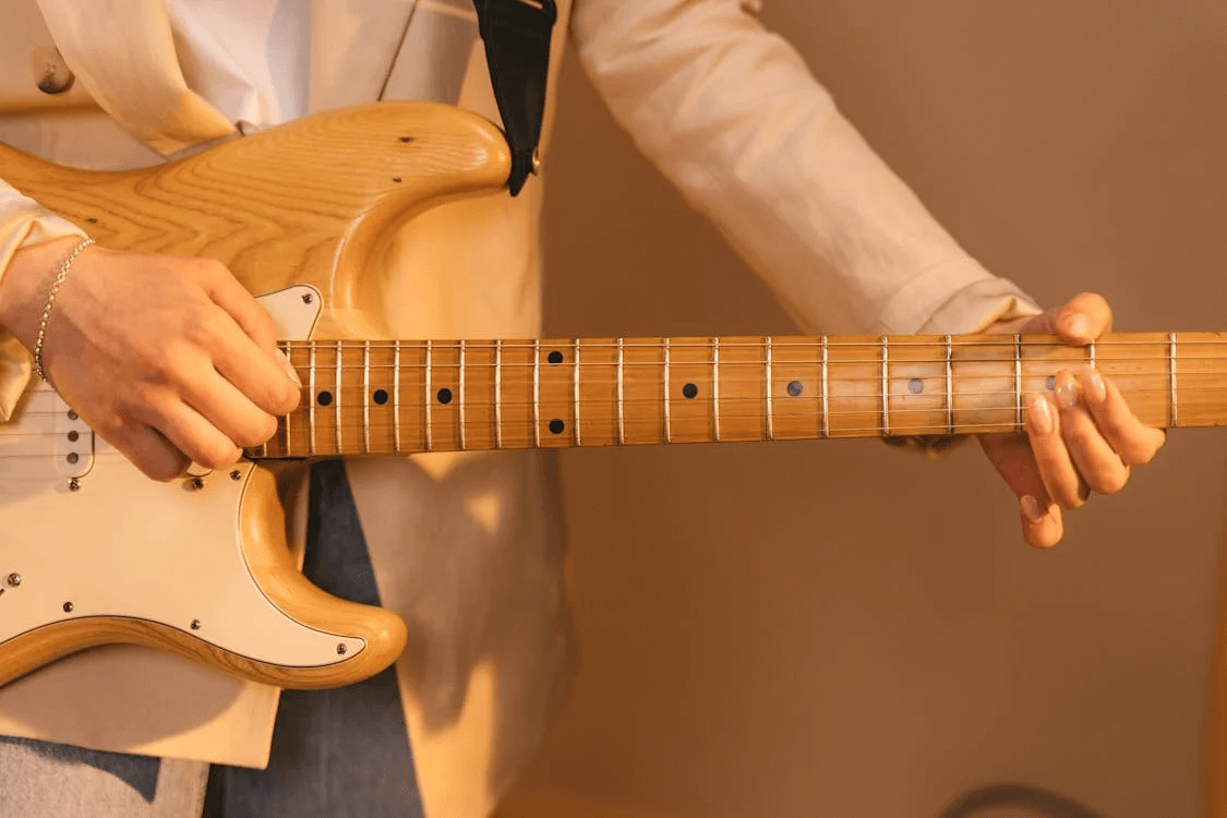 Advanced guitarist performing a complex solo.